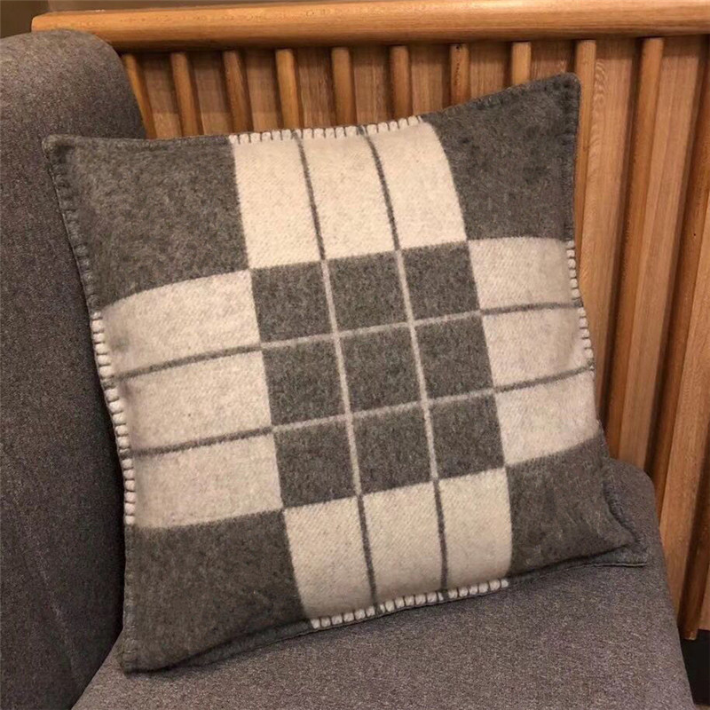 

High quality faux-wool pillowcase with letter pattern and color stripe in 2 sizes without pillow core