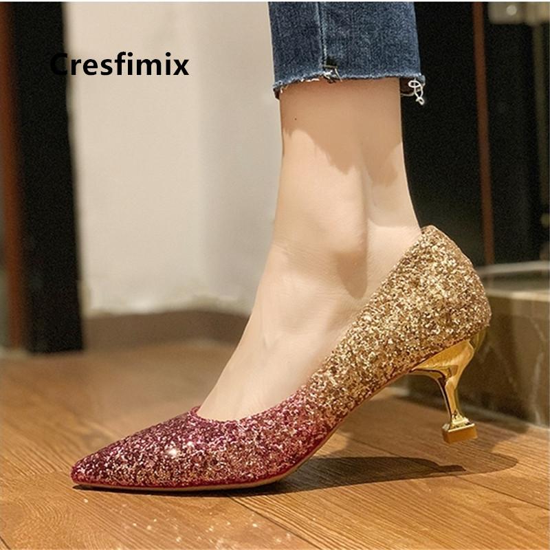 red shoes with gold heels