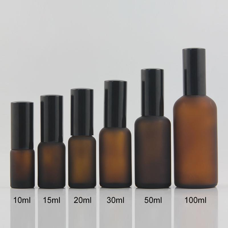

Round frosted amber glass essential oil perfume bottle 100ml, empty mist spray glass bottle with pump