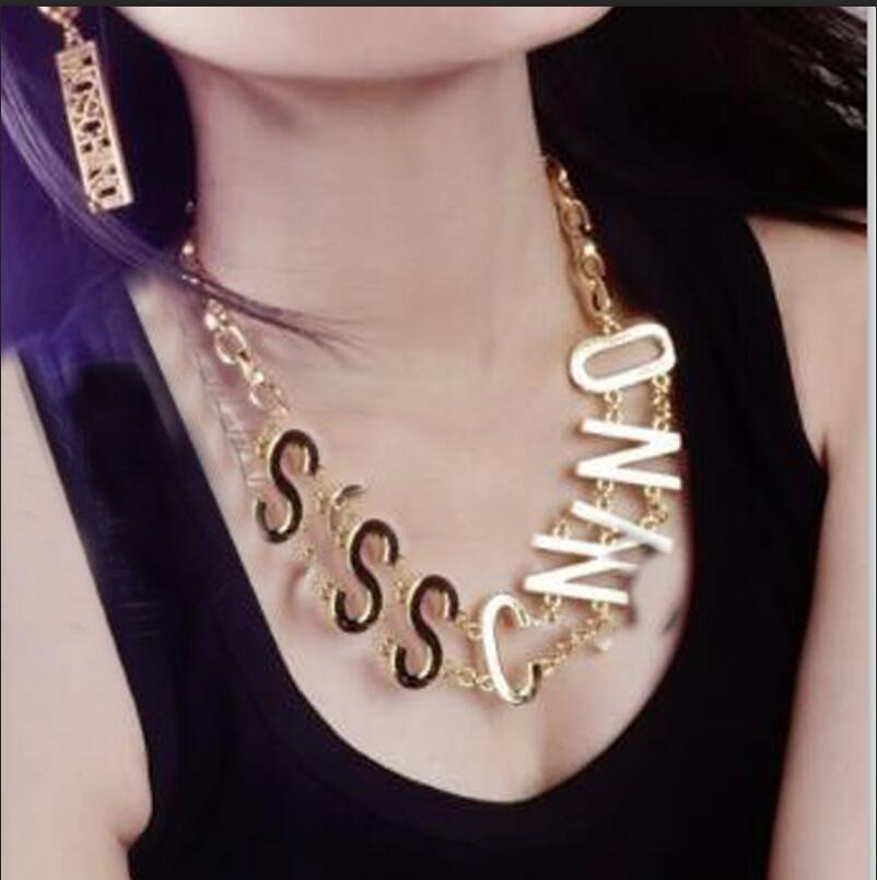 

Famous big M model catwalk show letter collar earrings fashion punk rock exaggerated chain clavicle necklace earrings