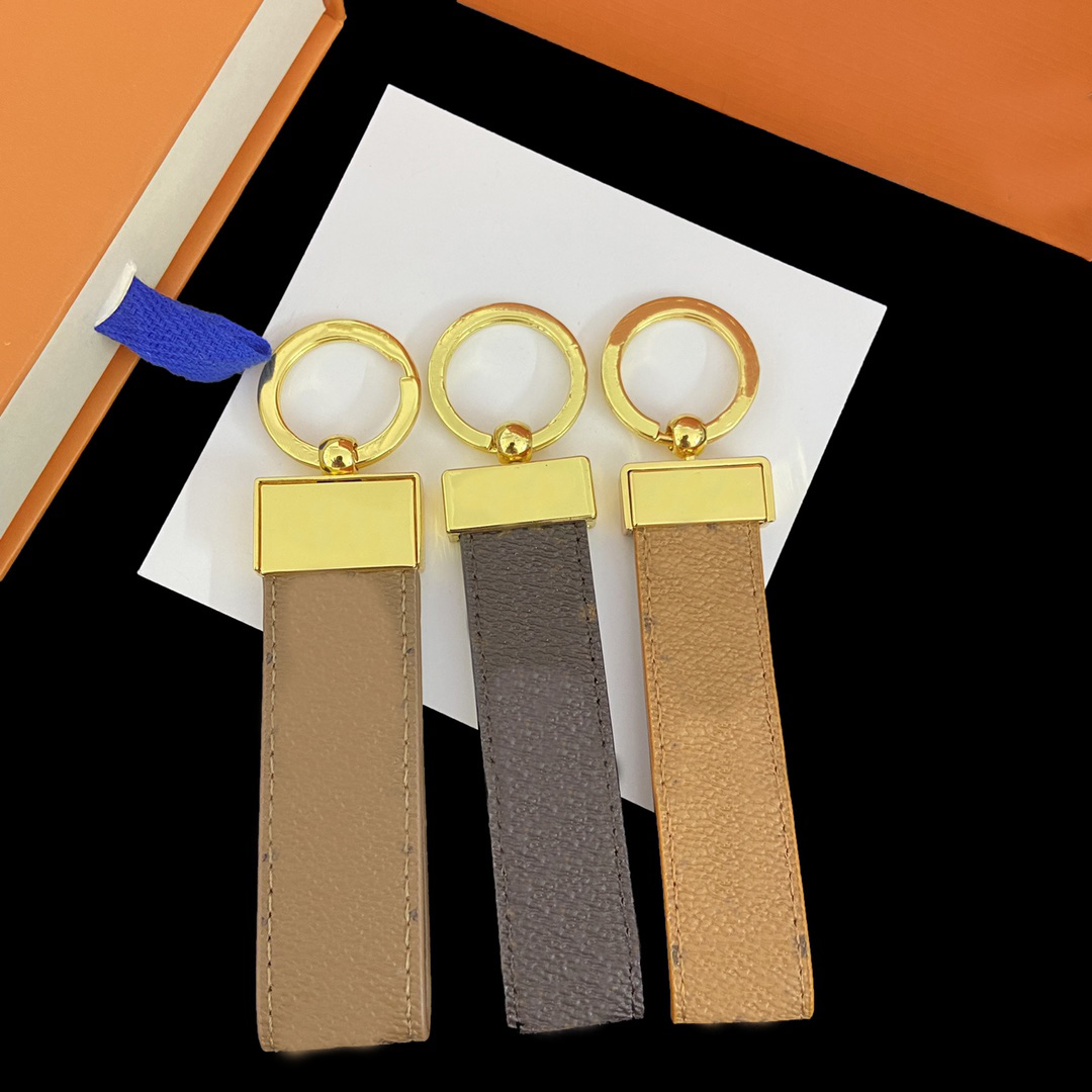 

2022 Woman Mans Designer Keychains High Qualtiy Alloy Fashionable Handmade Keychain Stylish Key Brsky Buckle Bag Charm Wholesale 22012003R