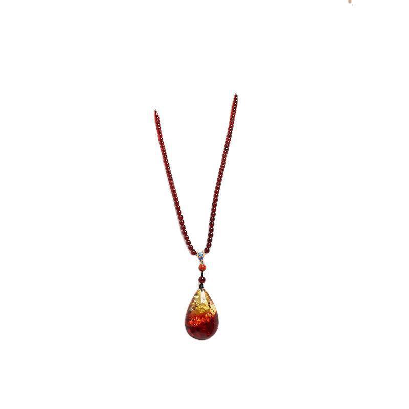 

Ceromel Natural Amber Flower Drop Blood Necklace for Man and Woman Mrh7
