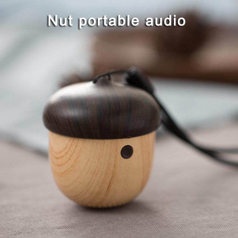 

J2 Wooden Nut Wireless Mini Bluetooth Speaker Stereo Sound Bag Pendant New Arrival