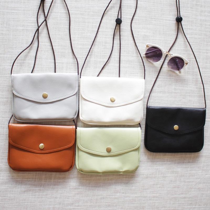 

Mobile phone bag slants across small bag, students' free Wallet