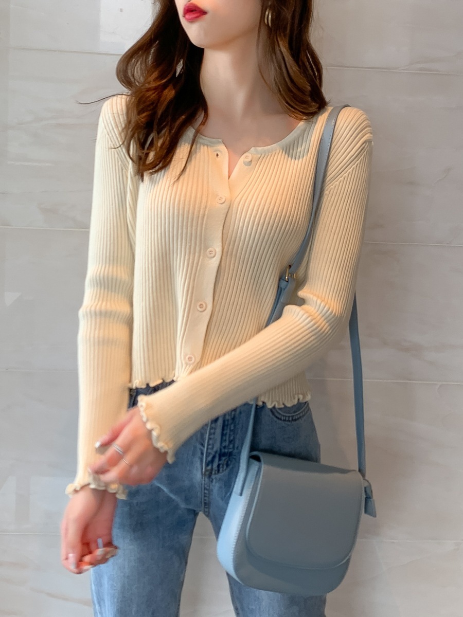 

Coat of wool knitted or crocheted long with short sleeves, White