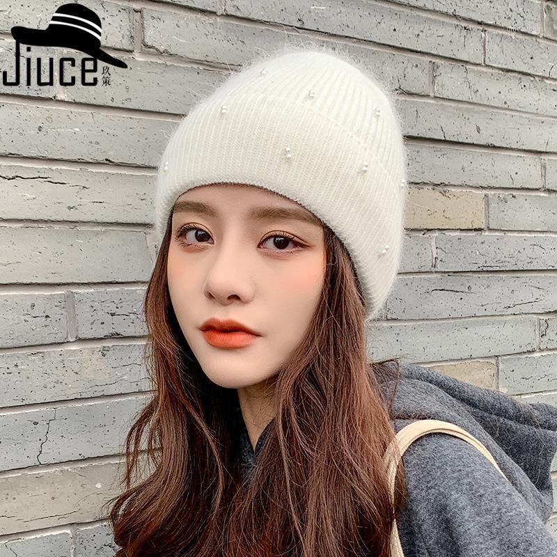

Autumn winter new add velvet thickened pearl rivet wool cap Han edition pure color simple joker ear protector knitted cap1