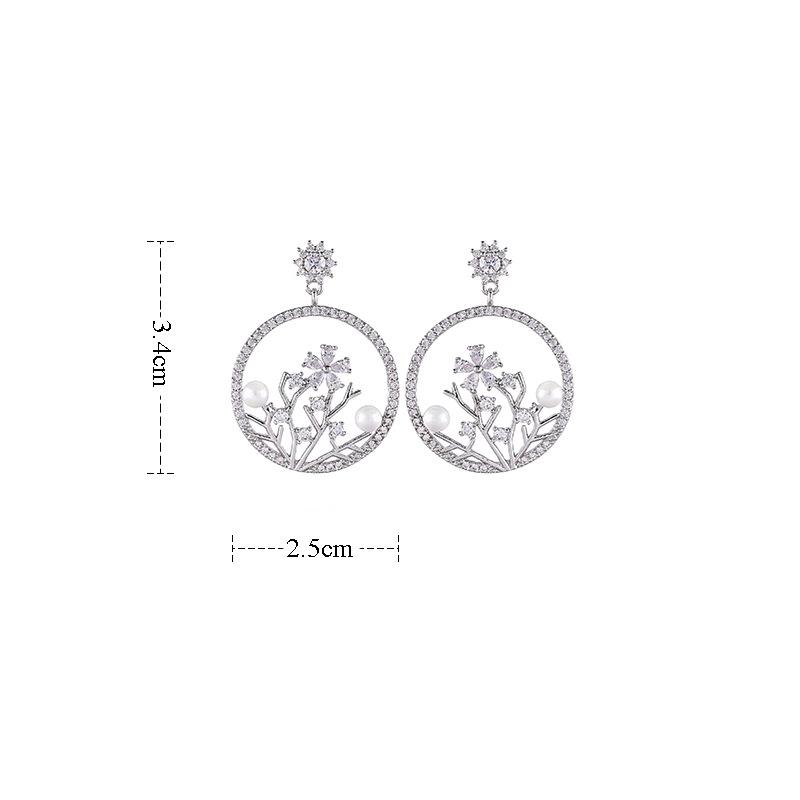 

European and American Creative Earrings Simple Hollow Flower Plant Earrings Pearl Jewelry Fashion Personality Accessories Wholes