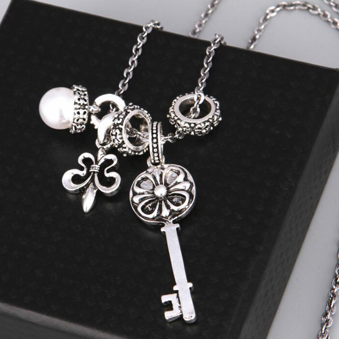

Fashion Flower Key Pendant Necklace Vintage Silver Sweater Chain Silver Cross Pendant Necklace Charm Jewelry for Women Gift
