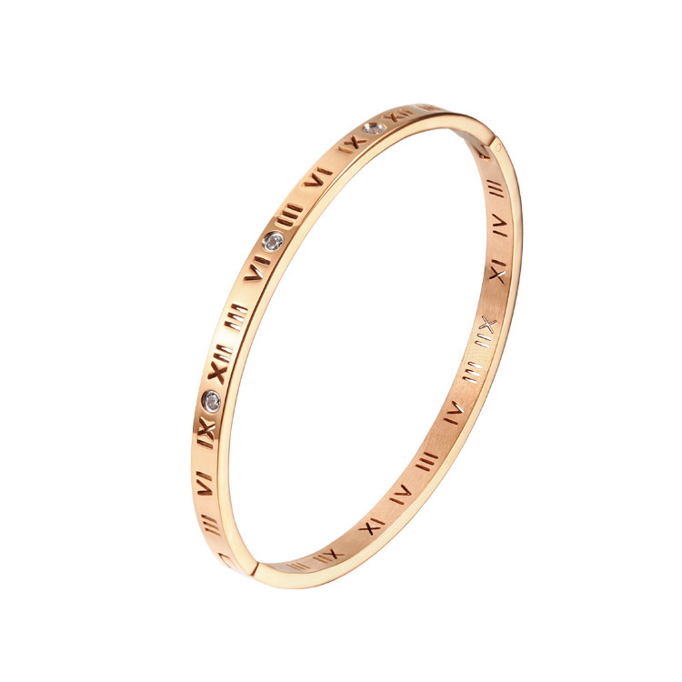 

Roman numeral bracelet with rose gold clasp and diamond ring F1130