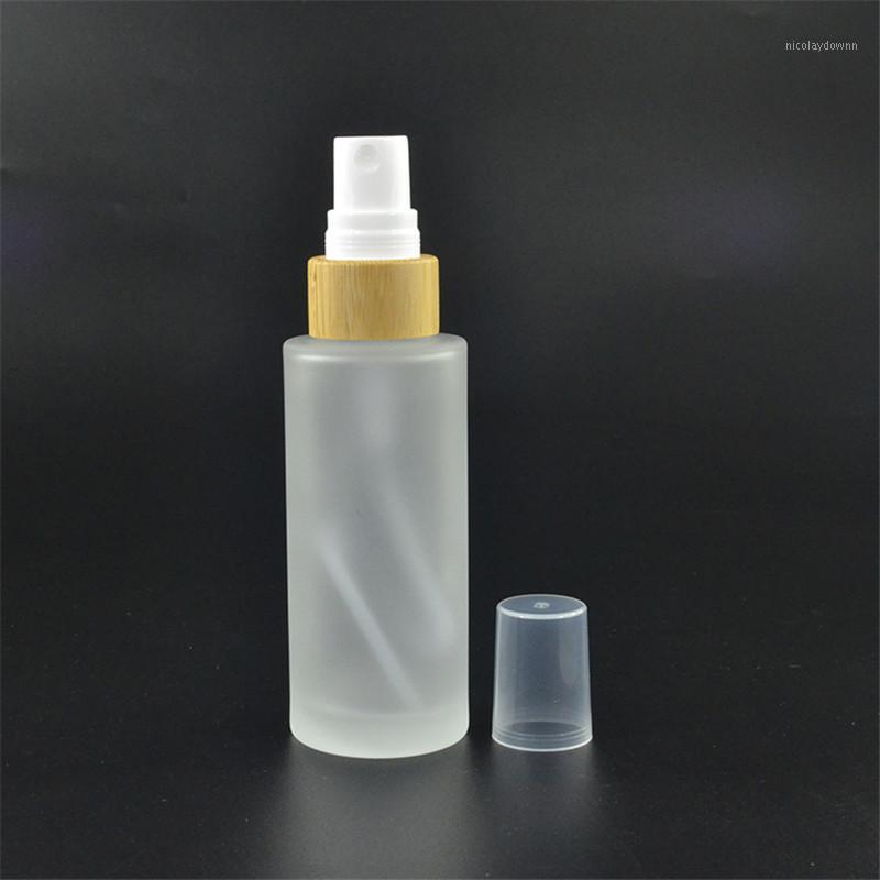 

50pcs*30ml translucent frosting glass spray bottle with bamboo pump head1