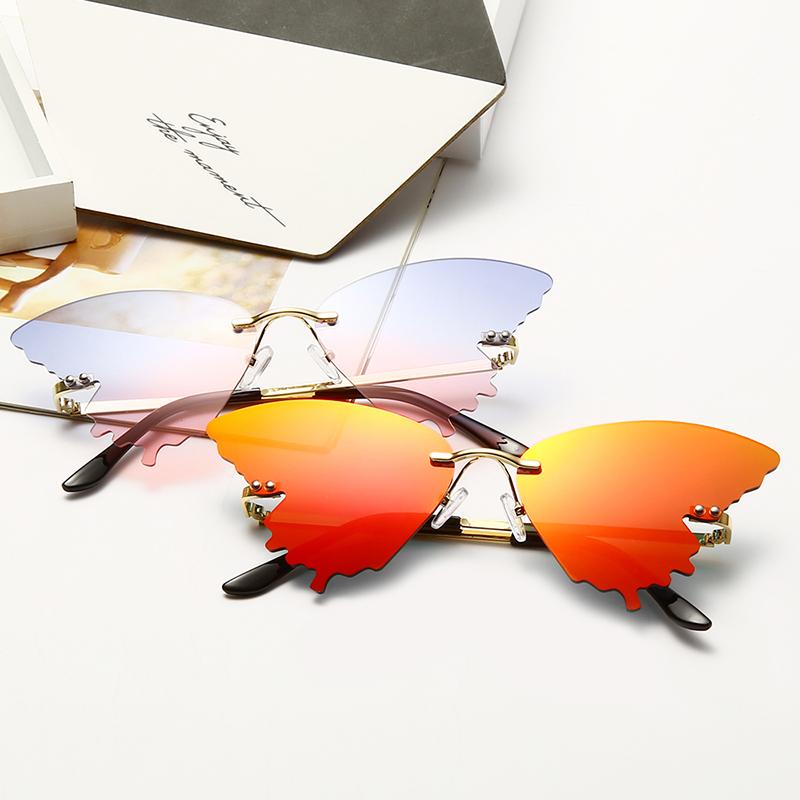 

Women Rimless Wave Sun Glasses Luxury Fashion Fire Flame Sunglasses Metal Shades for Vintage Women Mirror Eyewear UV400