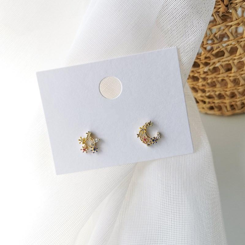 

2020 New sweet fashion star moon modelling earrings shiny multicolor crystal asymmetric Hollow metal flowers Women Stud earrings