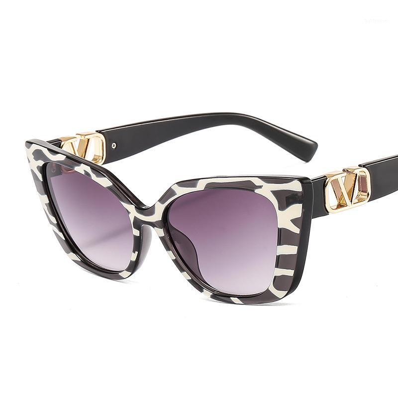 

2021 Fashion Cat Eye Sunglasses Women Men Leopard Cow Color Trend PC Lens Metal PC Frame V Logo Quality Luxury Beach Sun Glasses1