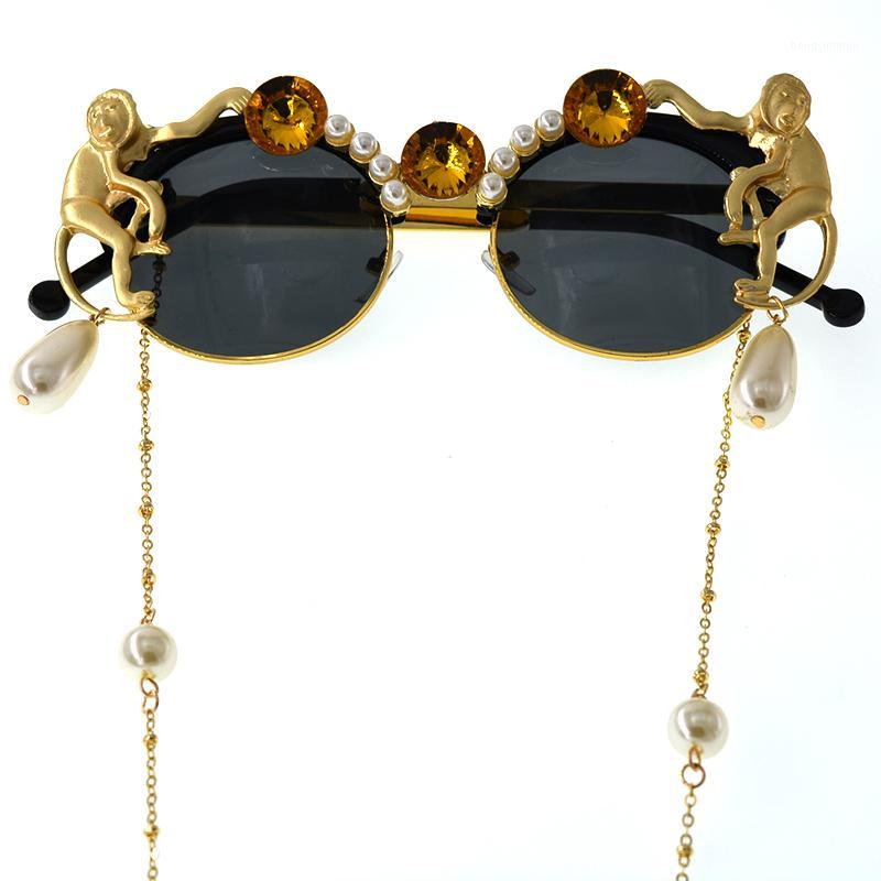 

Sunglasses 2021 Lady Gold Monkey Baroque Brand Metal Retro Leopard Frame Beach Chain Pearl Round Sun Glasses For Women1