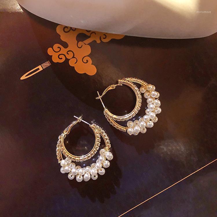 

Korean fashion jewelry geometric circle earrings literary temperament wrapped pearl ladies hoop earrings for women1