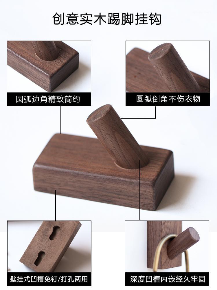 

Solid wood hook wall hanging wall clothes hook creative traceless perforation-free single door hanging hanger1