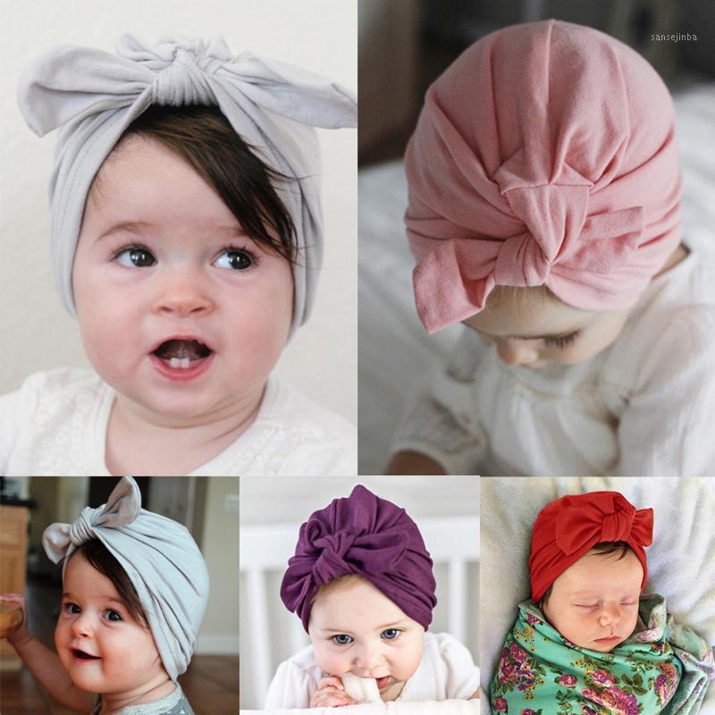 

Fashion Newborn Infant Baby Kid Child Boy Girl Turban Elastic Lovely Cap Bowknot Soft Cotton Ears Beanie Hat Caps1, White
