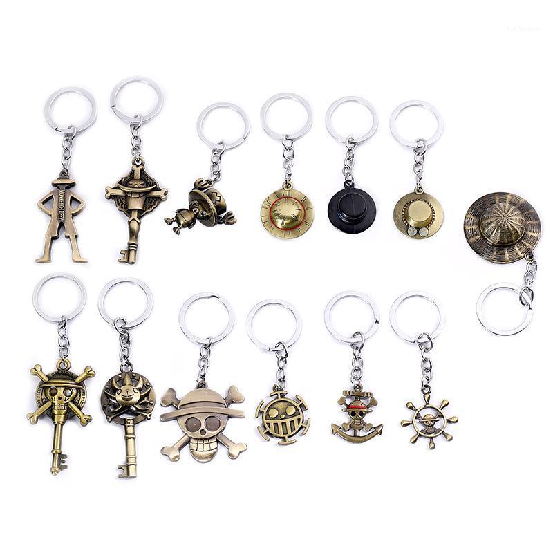 

Keychain Creative Metal Luffy Pirate Pendant Car Keyring Straw hat skull Anchor For Men Women Classic movie key chains gift1