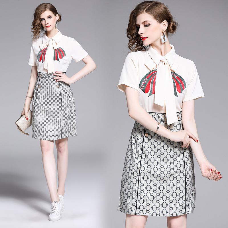 

2020 new fashion slim embroidered hem print stitching literary midi dress, Picture