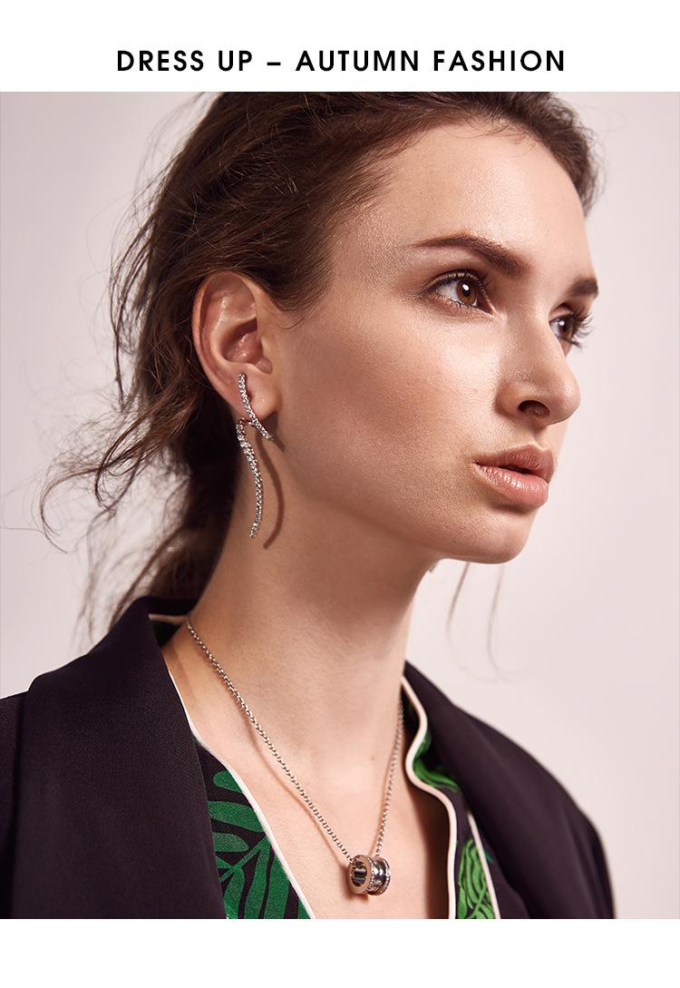 

2020 latest design brand creative personality curved long inlaid zircon generous minimalist earrings gift for women.