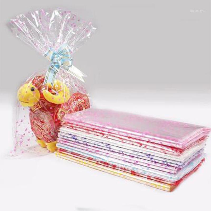 

100pcs/lot 4 sizes Large Plastic Gift Package Bag Plastic Packaging Bag Clear Cellophane Bakery Gift Packing1