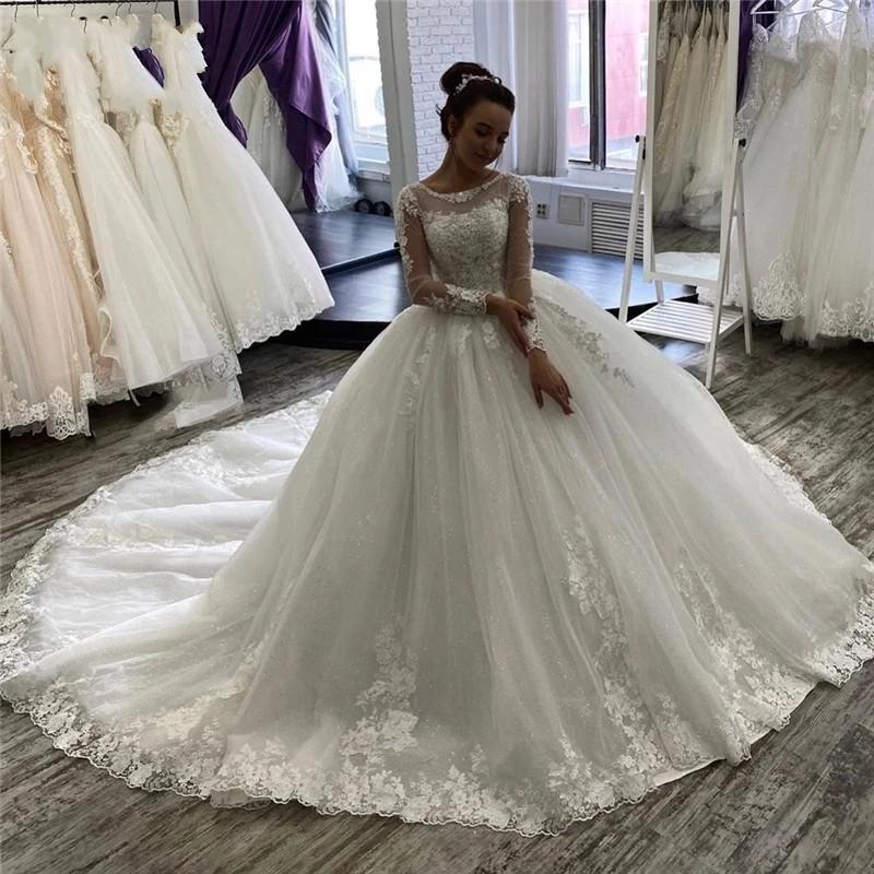 

Arabic Long Sleeves Ball Gown Lace Wedding Dresses with Beaded Appliques Jewel Neck Court Train Tulle Plus Size Bridal Gowns vestidos de nov, White