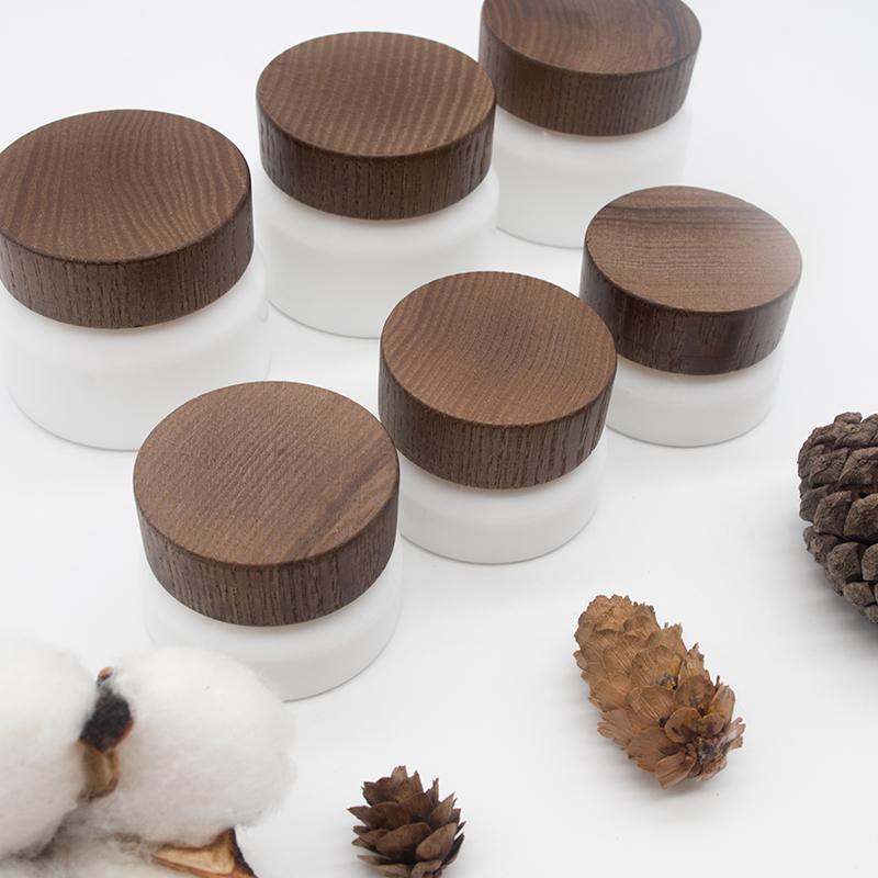 

15g 50g Frosted white travel Glass Jar Skin Care Eye Cream Jars Pot Refillable Bottle Cosmetic Container With Wood Grain Lid1