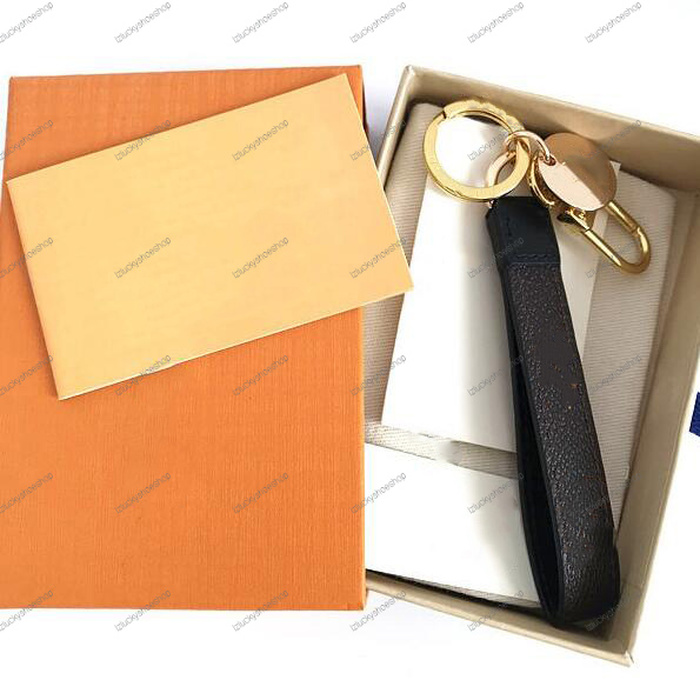 

With Box 2021 High Quality Car Handmade Keychain Brown Letter Flowers Leather Keychains Men Women Handbag Pendant Key Ring Accessories