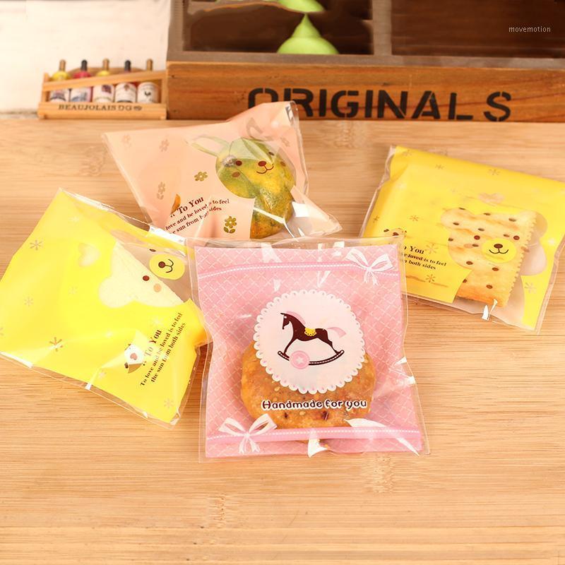 

100pcs Free shipping Cute cartoon cookie bag Dessert chocolate candy bags DIY Baking bags Cookie packaging1