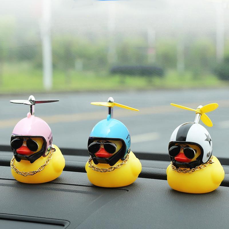 

1pc Lovely Lucky Duck Car Ornament Creative Decoration Car Dashboard Toys With Helmet And Chain Funny Auto Accessories Interior1