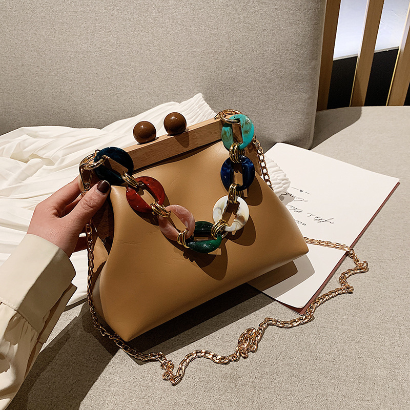 

Acrylic chain-of-wood fashion cuts women's handbags designer seashell luxury shoulder bags or crossbody leather bag lady vintage purse, Black.