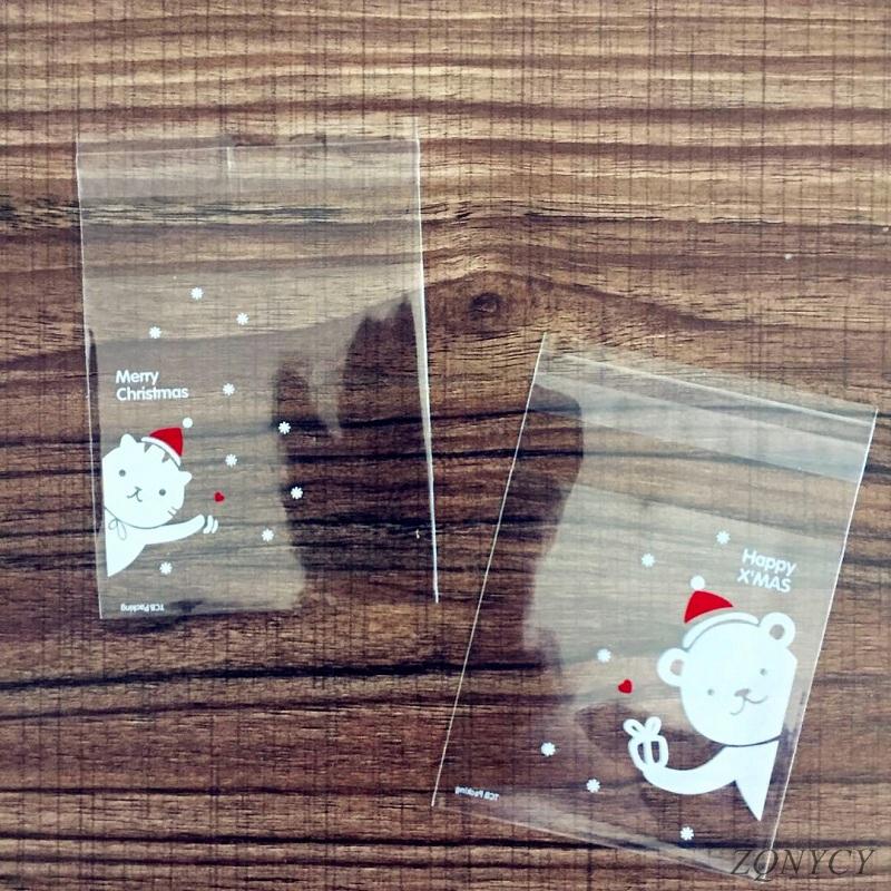 

100Pcs Christmas Candy Bags Cute Plastic Gift Cookies Packaging Bags Biscuits Snack Candy Cake Packing for Xmas Decoration