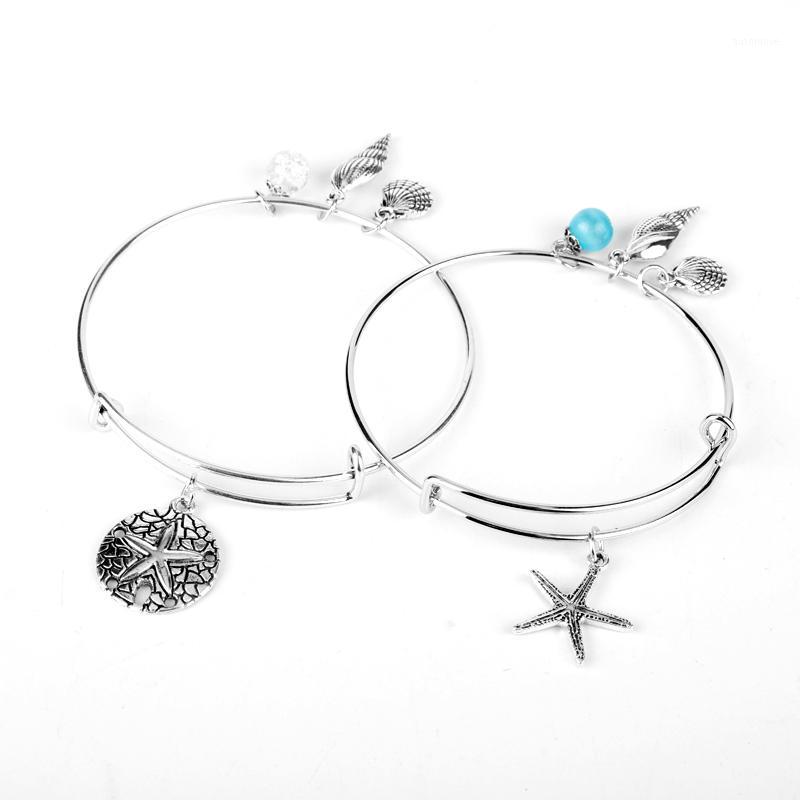

Hot Bohemia Ocean Animals Charms Bracelets Wholesale for Women Shell Conch and Starfish DIY Expandable Wire Bangles Dropshipping1
