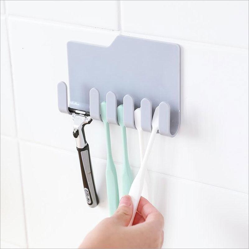 

Wall-mounted Sticker Hanging Toothbrush Holder Toothpaste Rack Multifunctional Umbrella Charging Shaver Holder Household Tools