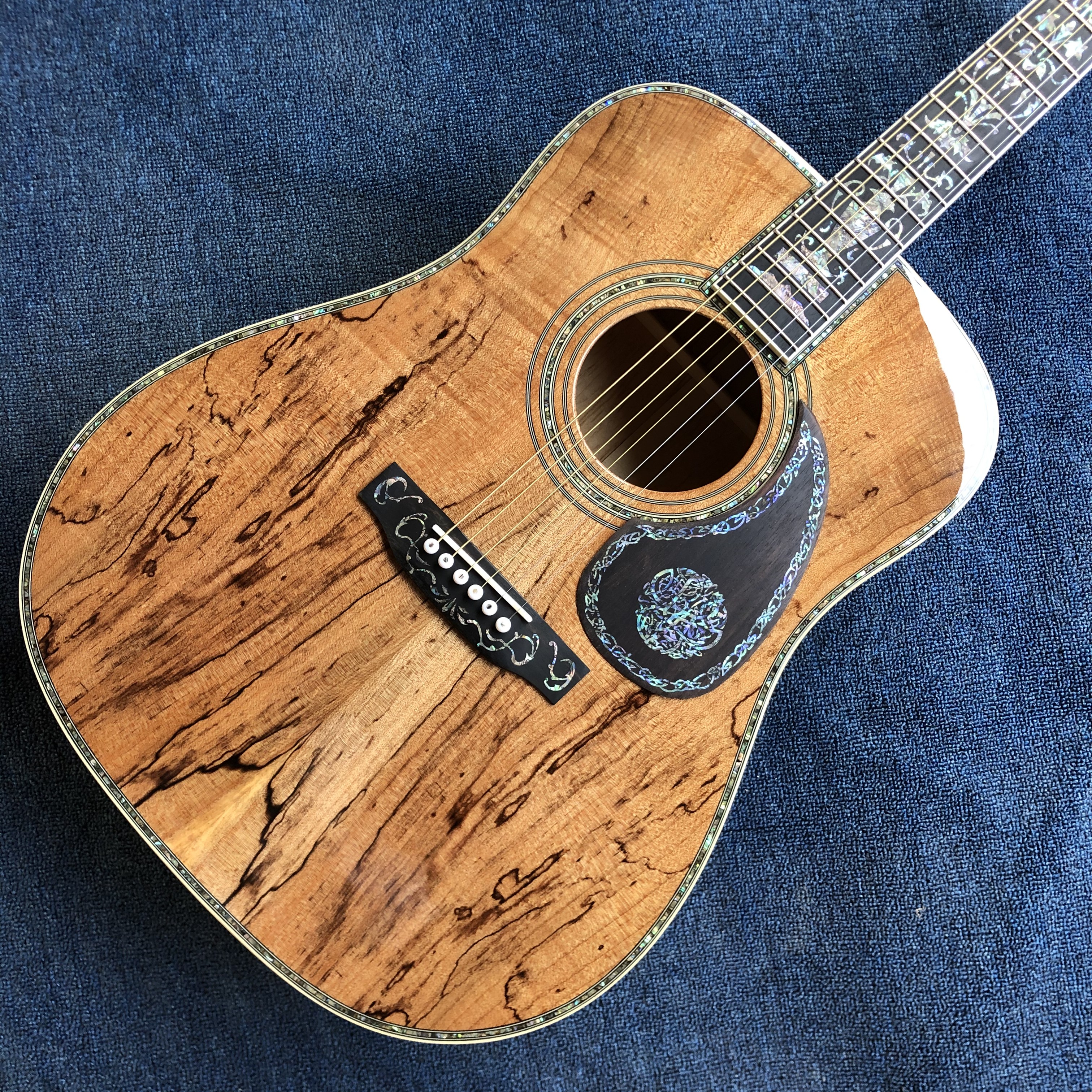 

2022 new 41-inch luxury acoustic guitar. Geotext top, sides and back, ebony fretboard abalone shell binding