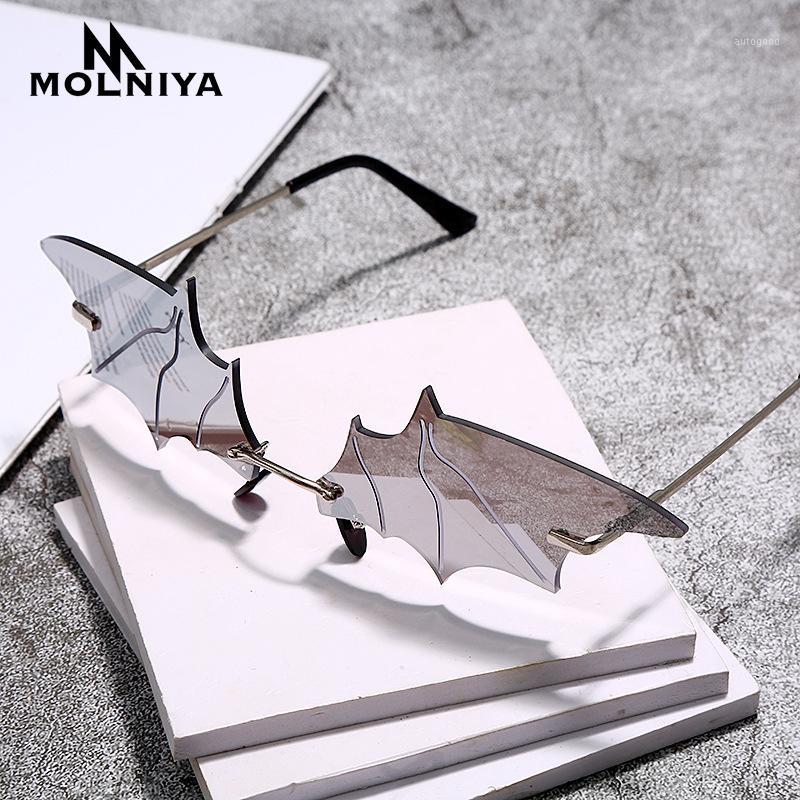 

Sunglasses MOLNIYA Fashion Bat Women Men Vintage Cat Eye Rimless Sun Glasses Unique Brand Designer Trending Female1