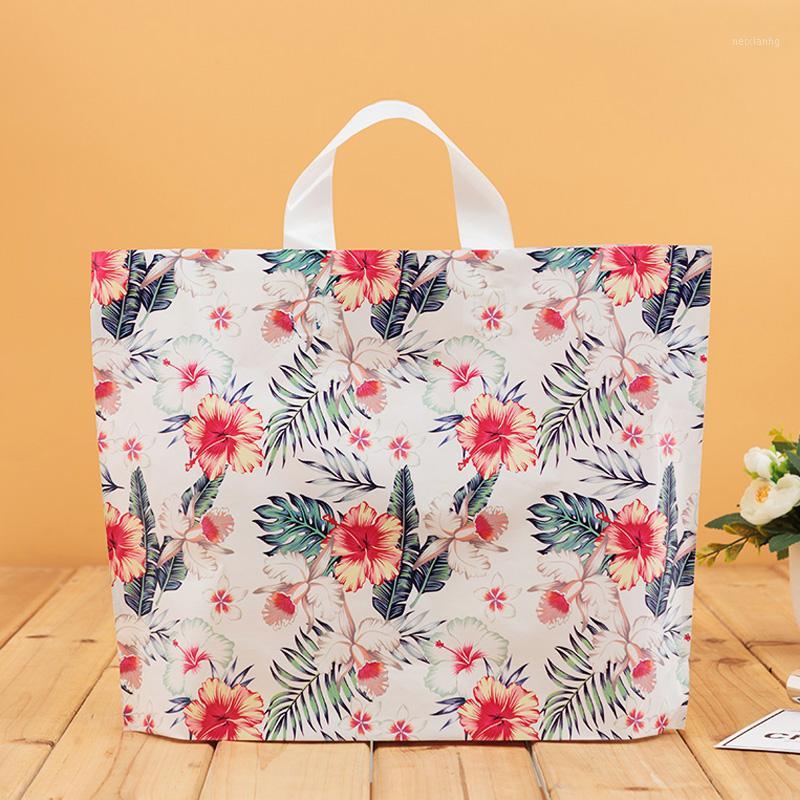 

50pcs/lot Flower Plastic Gift Bag Large Shopping Handle Bags Birthday Party Decoration Favor Packaging Bags1