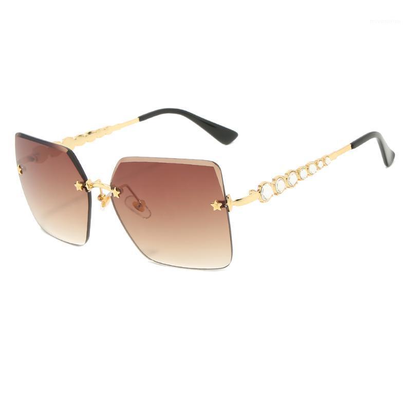 

2020 new spot high-end rimless cut diamond ladies sunglasses star metal sunglasses1
