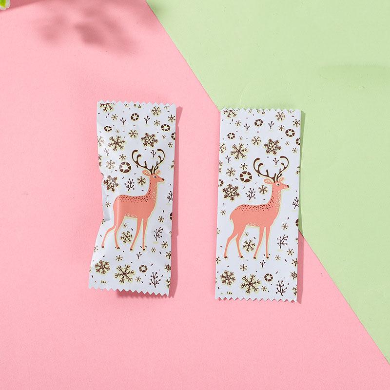 

100pcs Christmas Wrapping Bags White Frosted Pink Cartoon Reindeer Floating Gold Snowflakes Decor Soft Nougat Birthday Party Bag