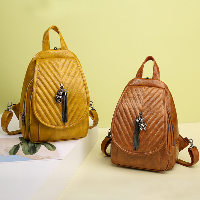

Wholesale ladies leathers shoulder bag sweet little fresh solid color leather backpack simple joker yellow embossed handbag street trend bow tassel backpacks, Yellow2 9213 style one