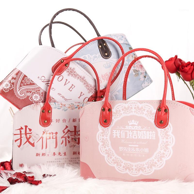 

Custom-made leather wedding bridesmaids return hand basket foreign trade creative heart-shaped holiday gift receiving basket1