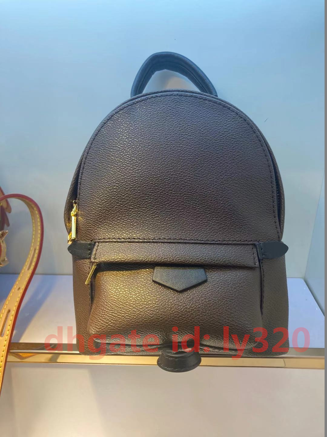 

Wholesale Top Quality Women's Mini Backpack Bag Oxide Leather Children Backpacks 41560 Genuine Leather Shoulder Bag Mini backpack dust bag, 15x22x9cm flower letter