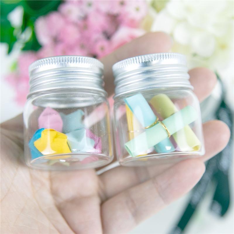 

24Pcs 20ml Bayonet Glass Bottles with Silver Spiral Aluminum Cap Small Hyaline Mini Craft Vials and Suitable for Candy Pot1