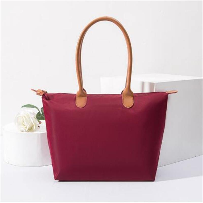 

Red Diaper Bag Large Capacity Baby Bag Wetbag Shoulder Mummy Nylon Portable Travel Luggage Dumpling1, J 44 30 18cm