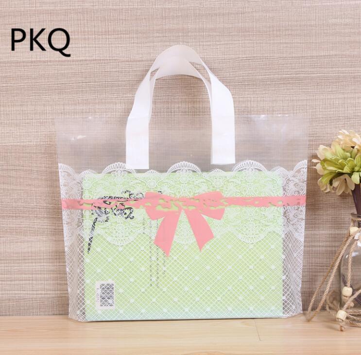

100pcs Lace Large Plastic Bags Party Favor Clothes Gift Packaging Bag Plastic Shopping Bags With Handle1
