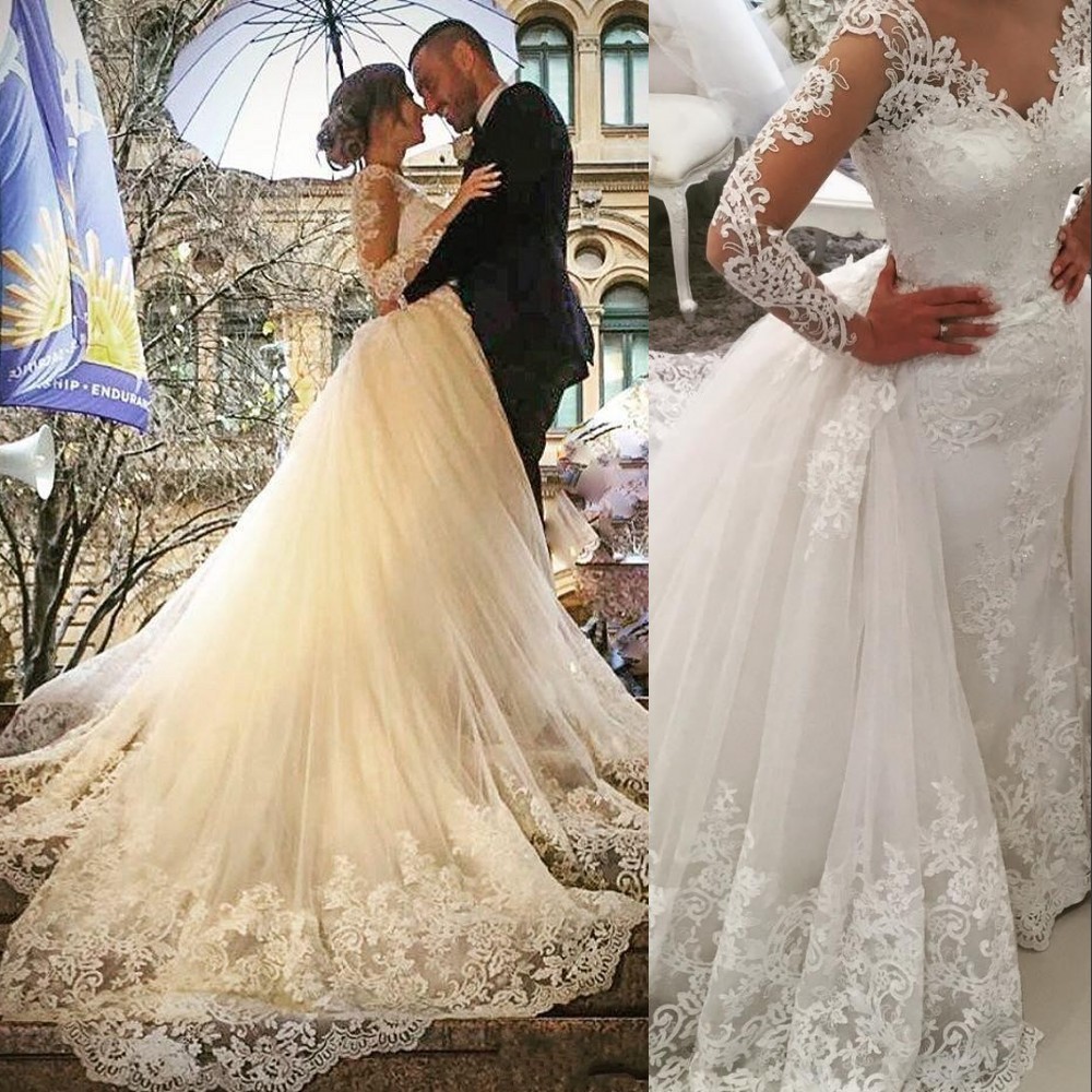 

2022 Luxury African Mermaid Wedding Dresses V Neck Long Sleeves Illusion Full Lace Applique Overskirts Detachable Train Button Back Bridal Gowns Plus Size, White