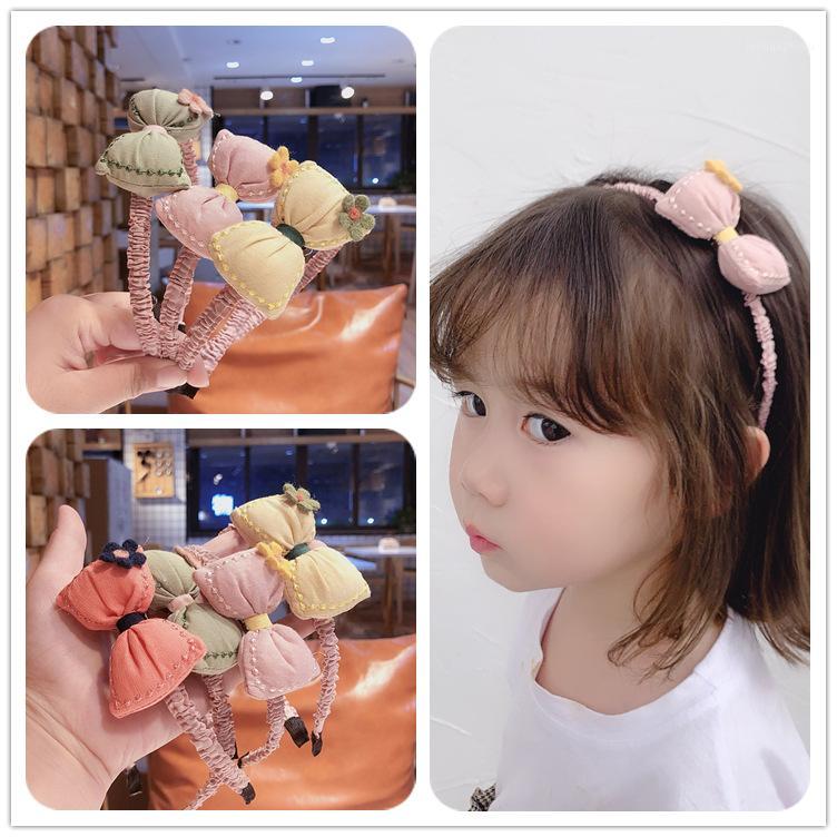 

New Korean Version Three dimensional Cotton Filled Small Pillow Bow Wool Flower Children Hair Hoop Head Clasp1