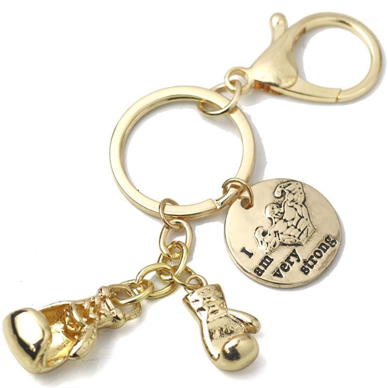 

Boxing Glove Keychain Wallet CrossFit Gold I am Very Strong Charms Key Ring Car Purse Bag Buckle Pendant Women Gym Jewelry1