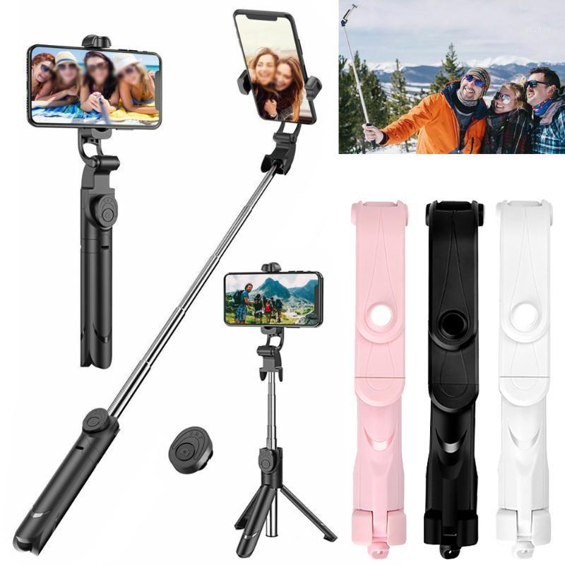

Wireless Bluetooth Selfie Stick Tripod With Remote Control Mini Foldable Tripod Extendable Monopod for Smartphone Selfie Stick1