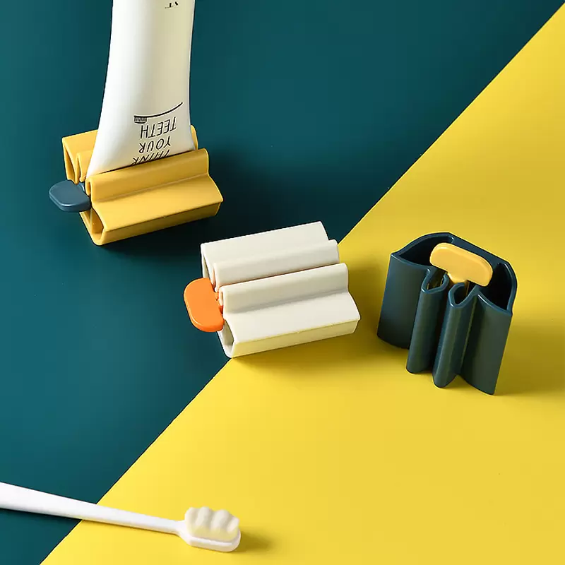 

New Bathroom Accessories Toothpaste Squeezer Tooth Paste Dispenser Holder Tube Squeezer Facial Cleanser Press Rolling Holder for Kids